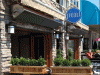 outdoor-infrared-heaters-mounted-above-sidewalk-cafe