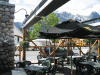 outdoor-infrared-patio-heaters-above-patio-with-umbrellas