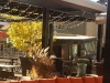 restaurant-outdoor-heaters-mounted-above-patio-furniture