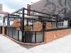 uncovered-restaurant-patio-with-infrared-heaters-mounted-above